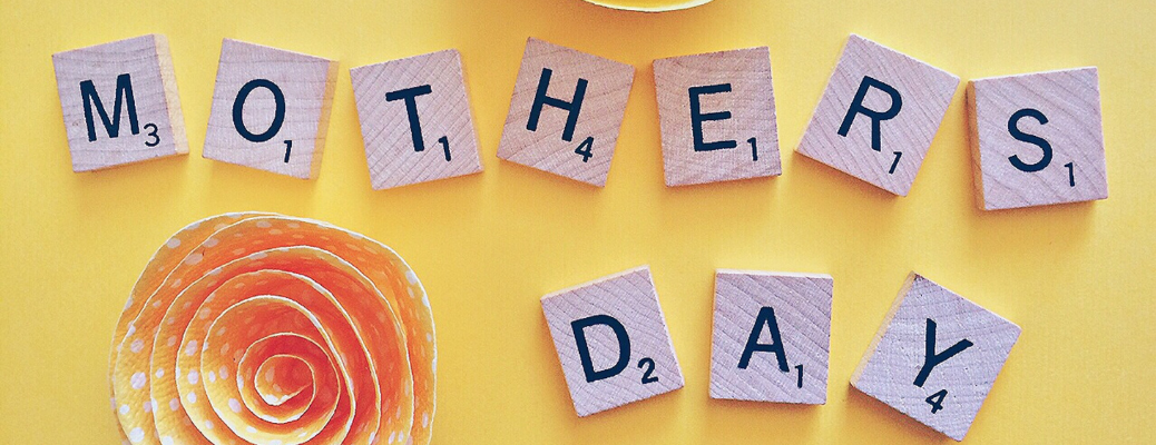 Scrabble letters spelling out "Mothers Day"