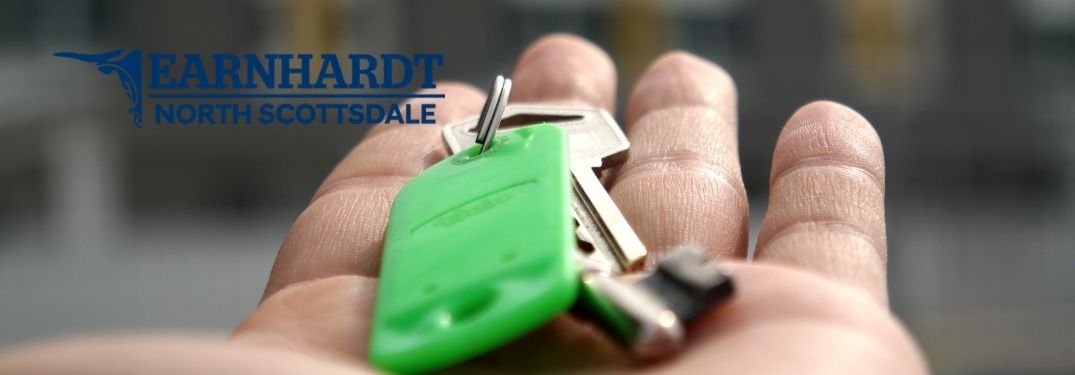 Close Up of Hand with Car Keys and Earnhardt Hyundai of North Scottsdale Logo