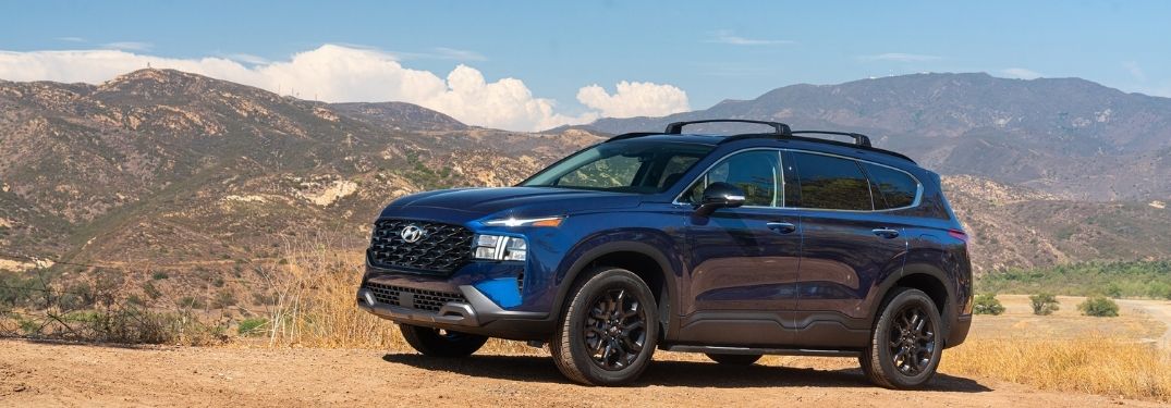 Blue 2022 Hyundai Santa Fe XRT on a Mountain