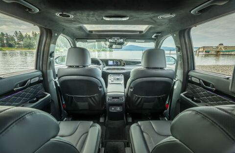 Hyundai Palisade SUV interior with second and third row seats.