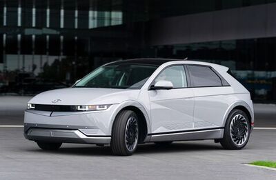 A silver Hyundai Ioniq 5 parked in a parking lot.