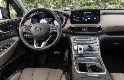 Hyundai Santa Fe interior with driver's seat and dashboard.