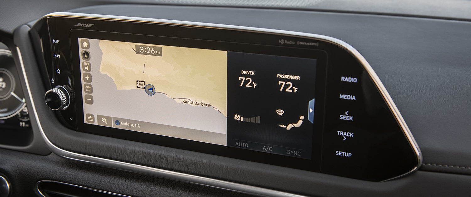 A close-up of the infotainment system screen in a Hyundai Sonata Hybrid. The screen displays a map navigation interface with the current location near Santa Barbara, California, and the current time.